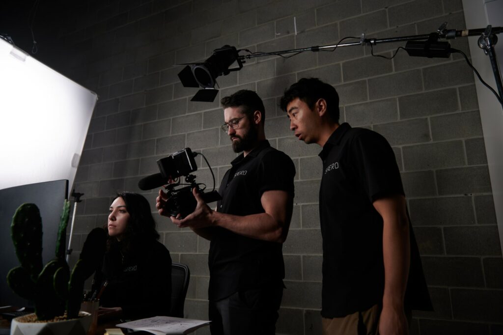 studio spero team reviewing photography footage