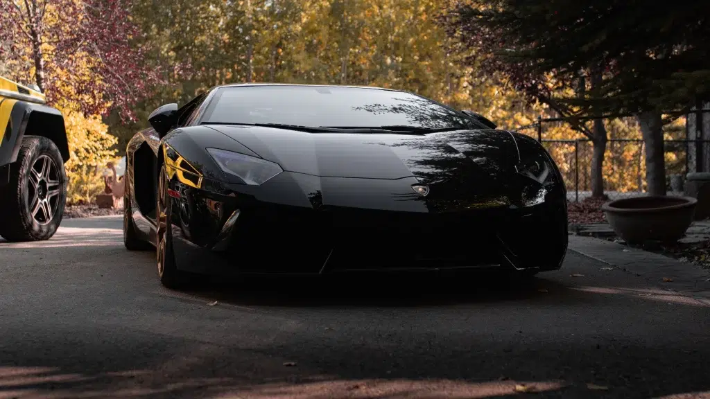 A black Lamborghini during a brand video.