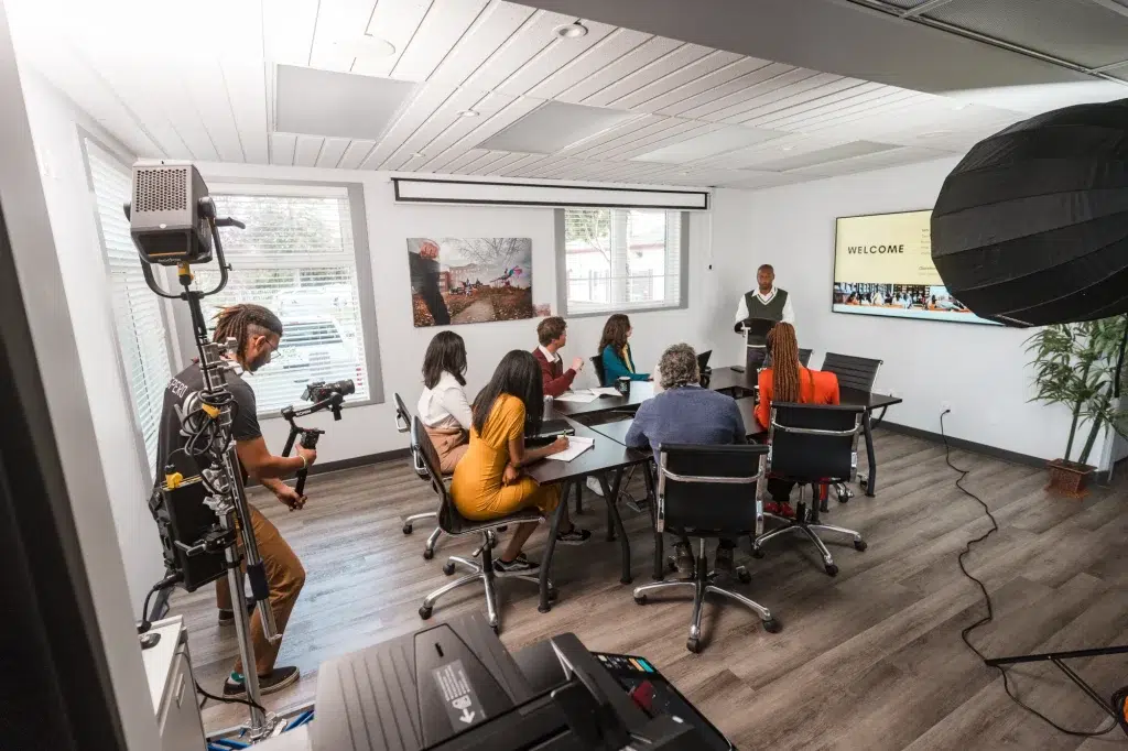 A professional videographer in Calgary records a corporate video.