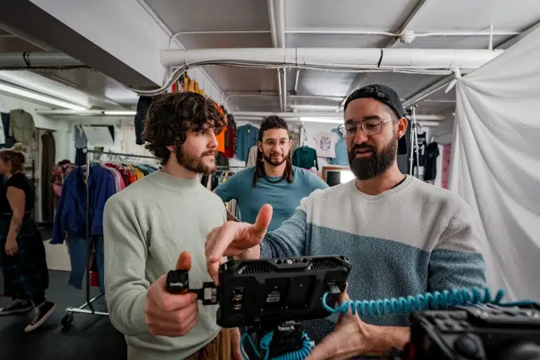 A videographer in Calgary begins filming an ad for a local consignment store.