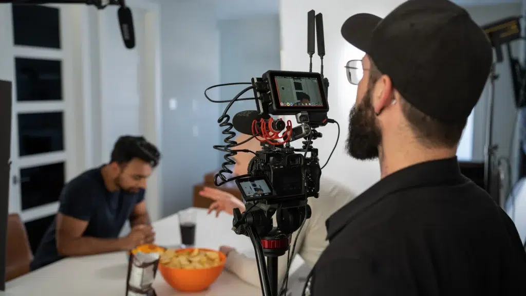 A videographer shoots a scene for an ad video in Calgary.